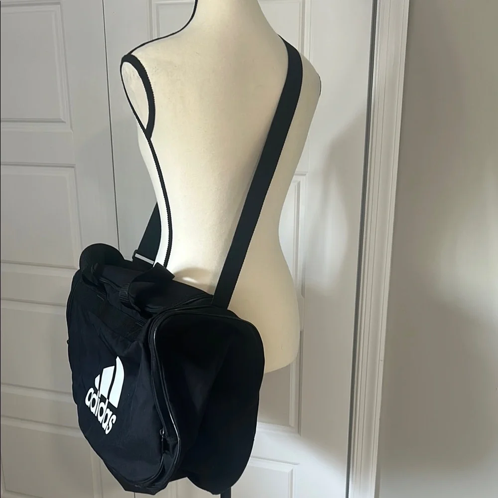 Adidas Black Duffel Travel Weekender Bag with Durable Fabric and Classic Design